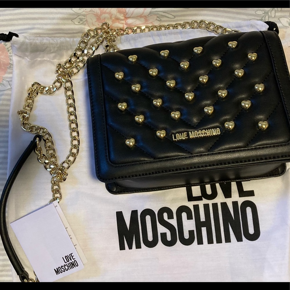 N/u removed tag lovemoschino comes with storage bagcare tag